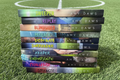 A stack of ten romance novels by Amy Daws, titled Sweeper, Replay, Blindsided, Payback, Dominate, Surrender, Keeper, Endurance, Challenge, and Strength, displayed on a wooden shelf.